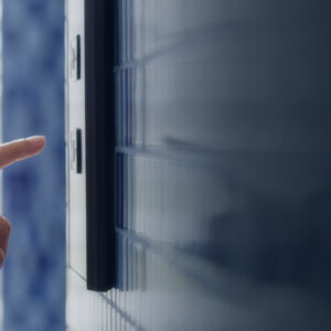 Woman pressing an elevator button